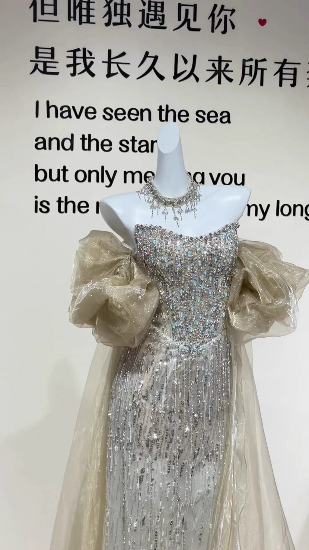 TwinkleGowns SL213 Silver Crystal Beaded Off-Shoulder Evening Gown with Sheer Train