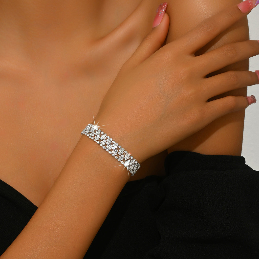 New store opening: Purchase a dress and receive a free Gold Rhinestone Jewelry Bracelet.