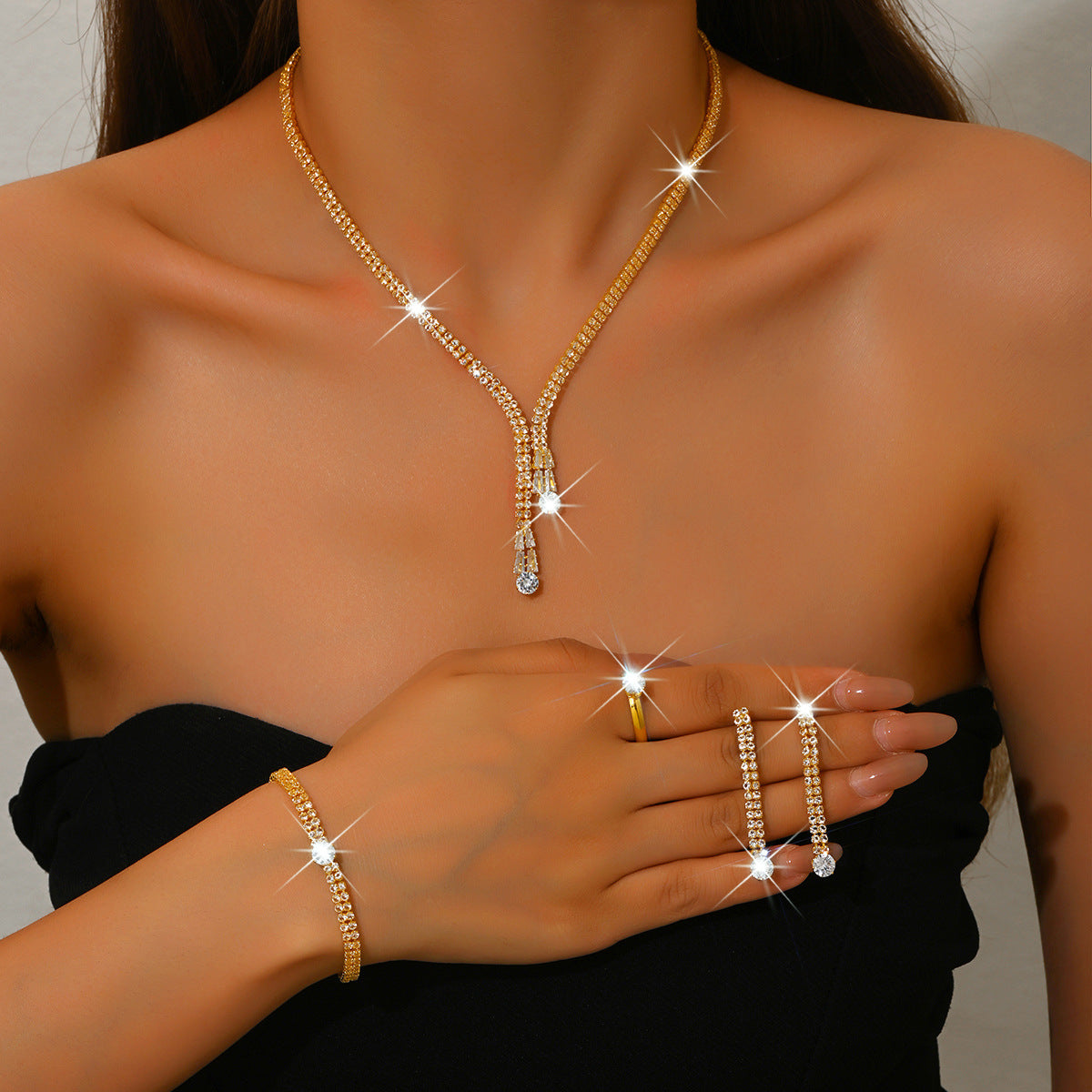 Elegant Gold Crystal Jewelry Set for Women 4 Piece Necklace Earrings Bracelet Ring