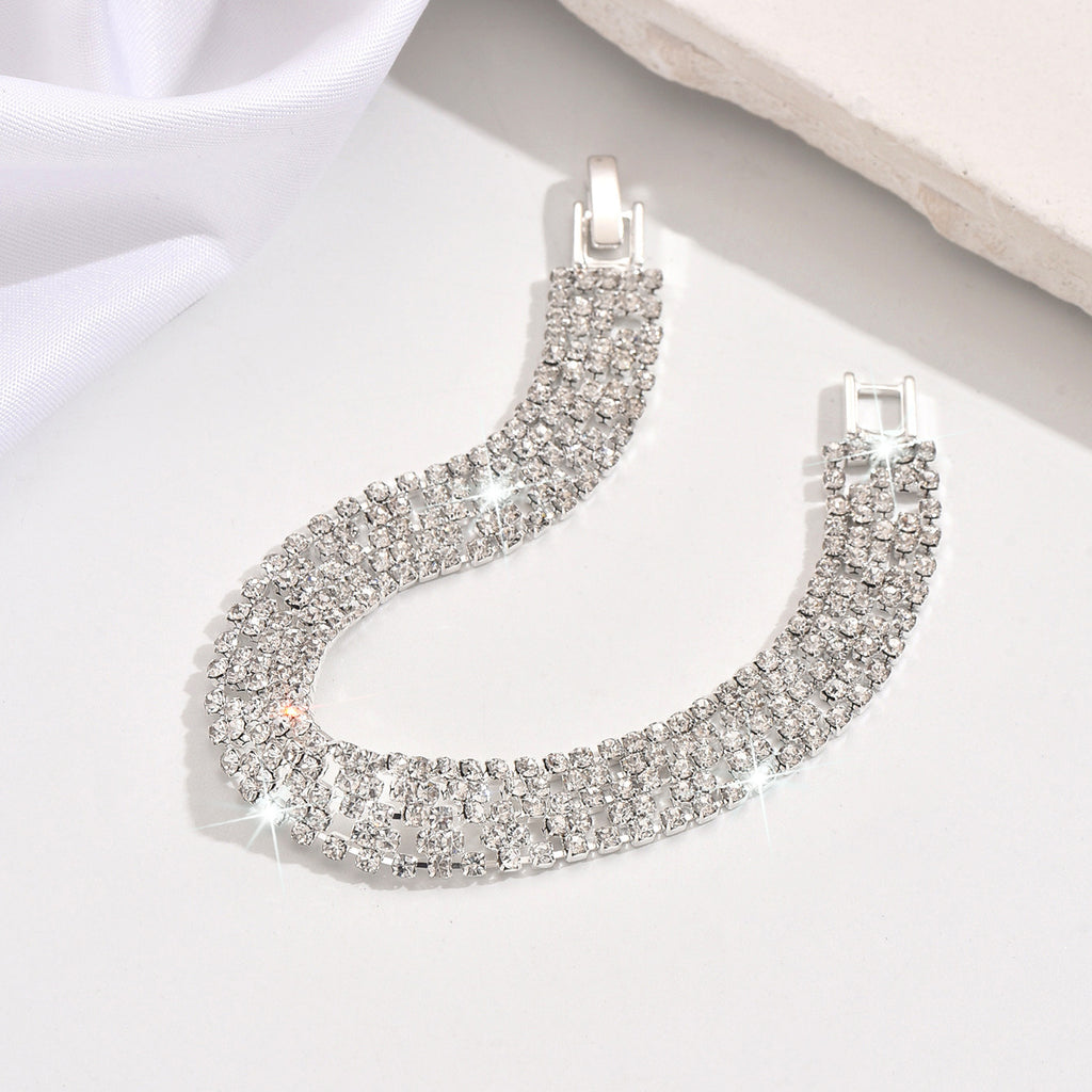 New store opening: Purchase a dress and receive a free Gold Rhinestone Jewelry Bracelet.