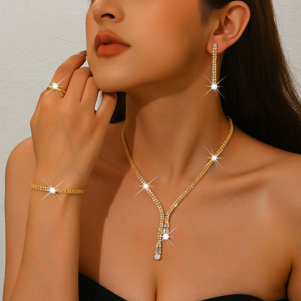 Elegant Gold Crystal Jewelry Set for Women 4 Piece Necklace Earrings Bracelet Ring