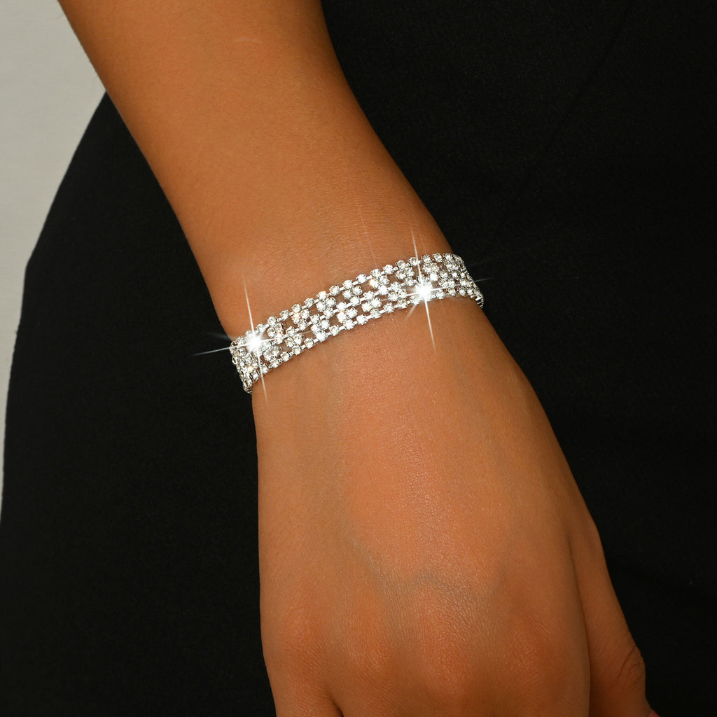 New store opening: Purchase a dress and receive a free Gold Rhinestone Jewelry Bracelet.