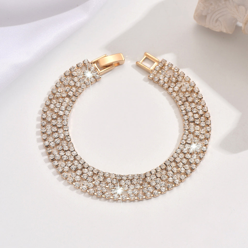 New store opening: Purchase a dress and receive a free Gold Rhinestone Jewelry Bracelet.