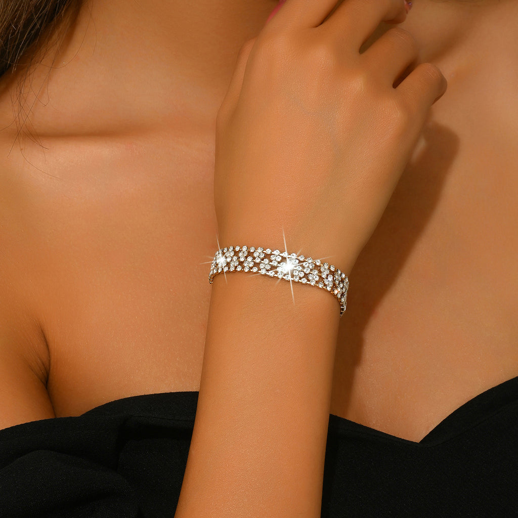 New store opening: Purchase a dress and receive a free Gold Rhinestone Jewelry Bracelet.