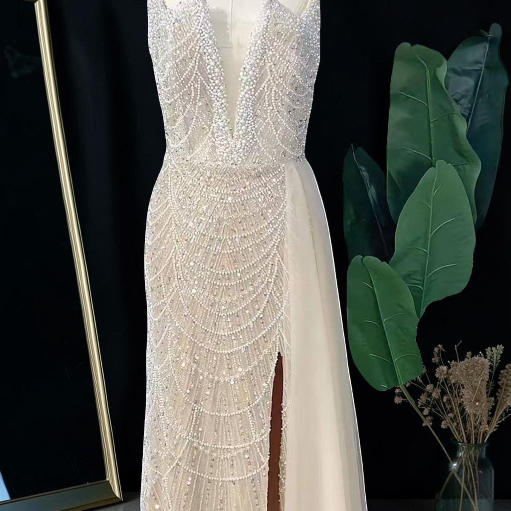Glamorous Beaded Evening Dress with High Slit and Tulle Overlay SL192