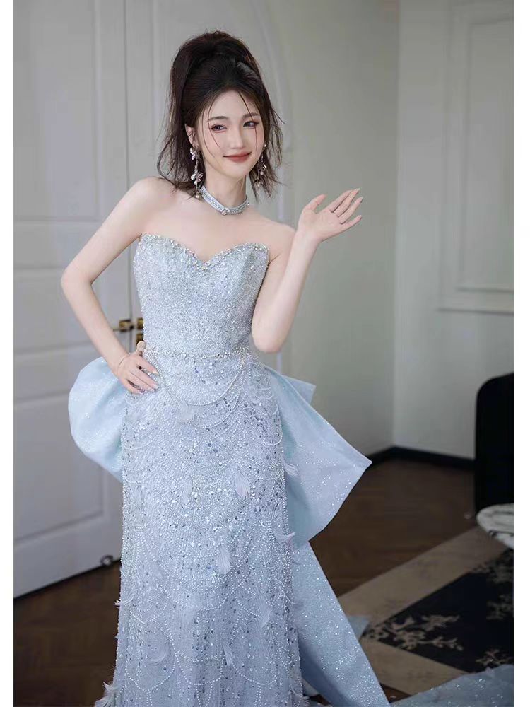 Glamorous Sequined Silver Strapless Bow-Back Evening Dress